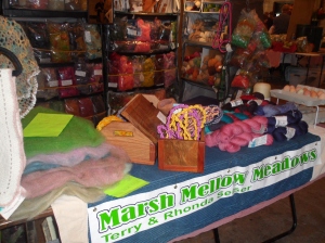 Our Farm table with Terry's wood work and my hand dyed yarns and needlefelted batts